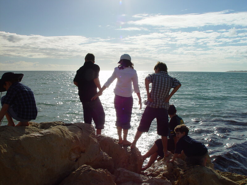 Children on Rocky Shore
