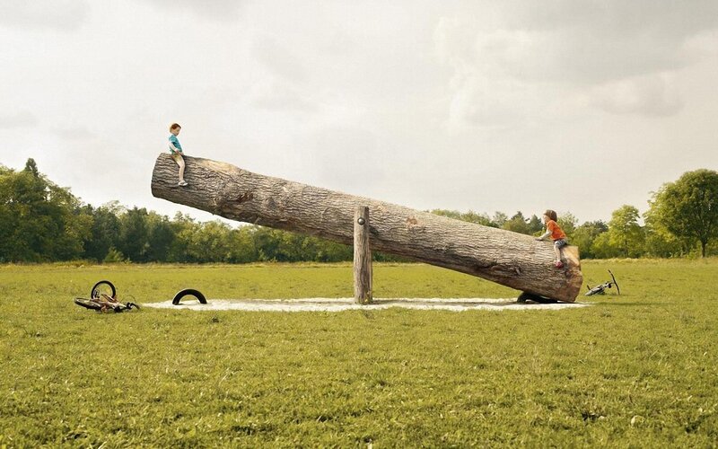 Children on Seesaw — Green, Calm, Afternoon, Photograph