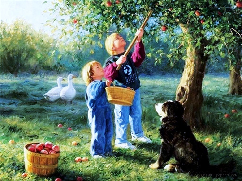 Children picking apples in orchard