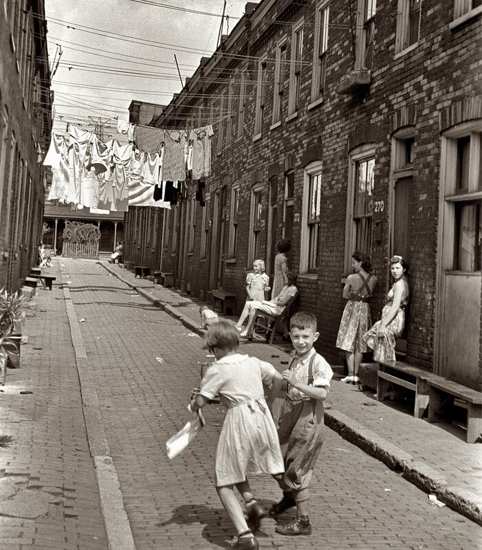 Children playing in alleyway