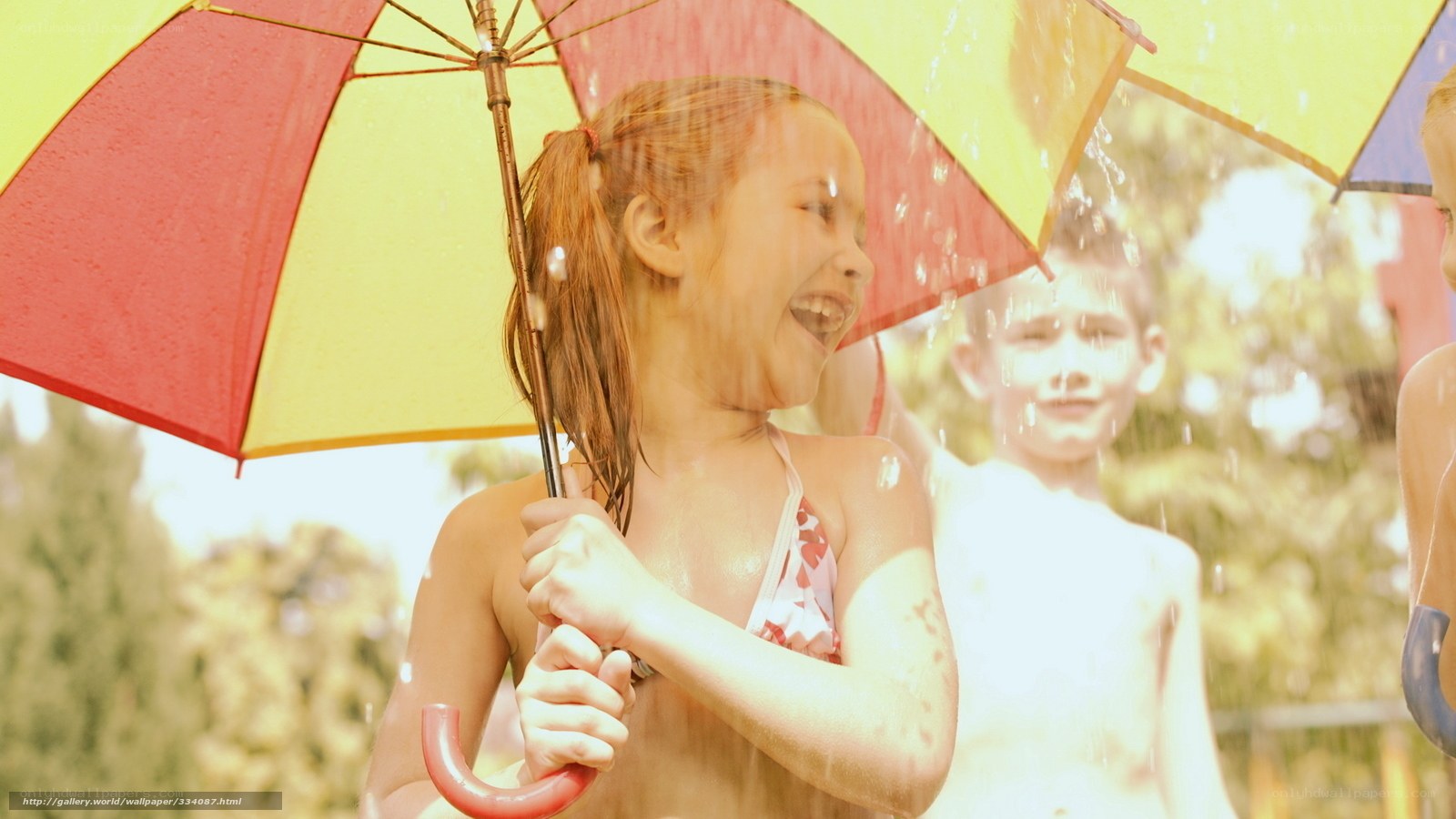 Children playing in the rain