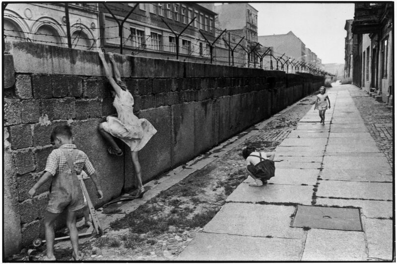 Children playing near the Berlin Wall