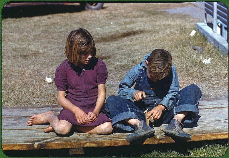 Children playing on a bench