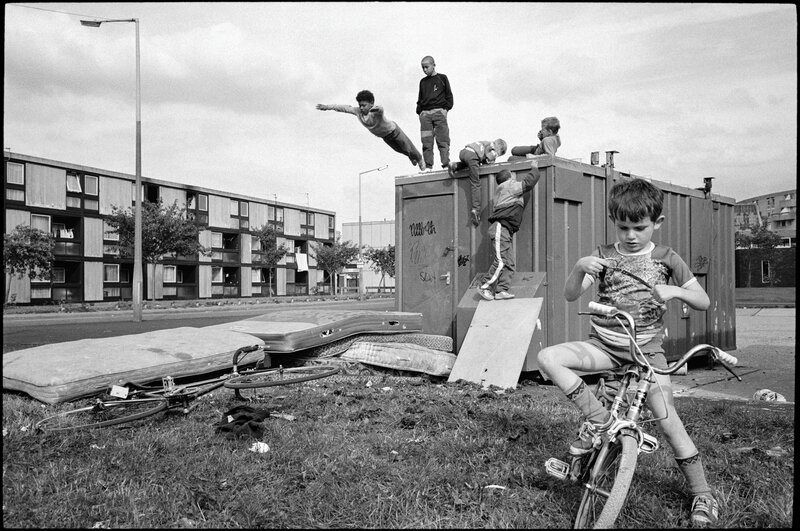 Children playing on a container