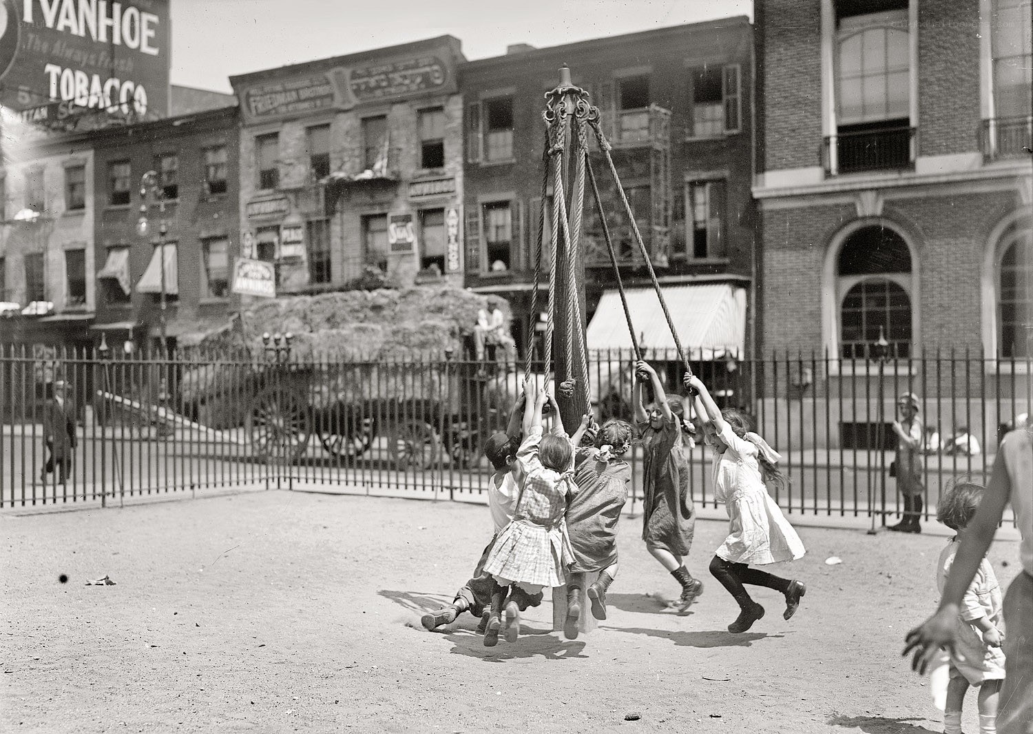 Children playing on a rope swing
