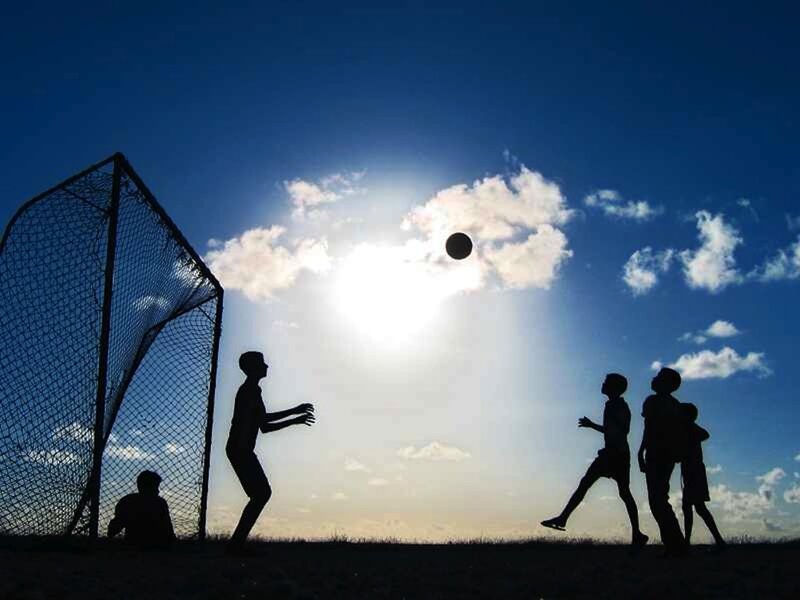 Children Playing Soccer — Blue