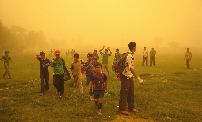 Children Playing Soccer — Yellow