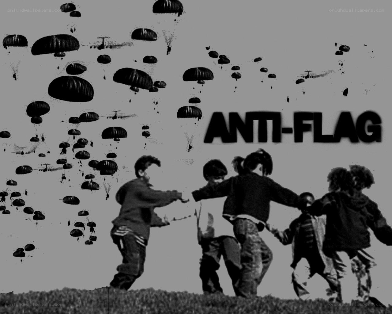 Children playing under parachutes
