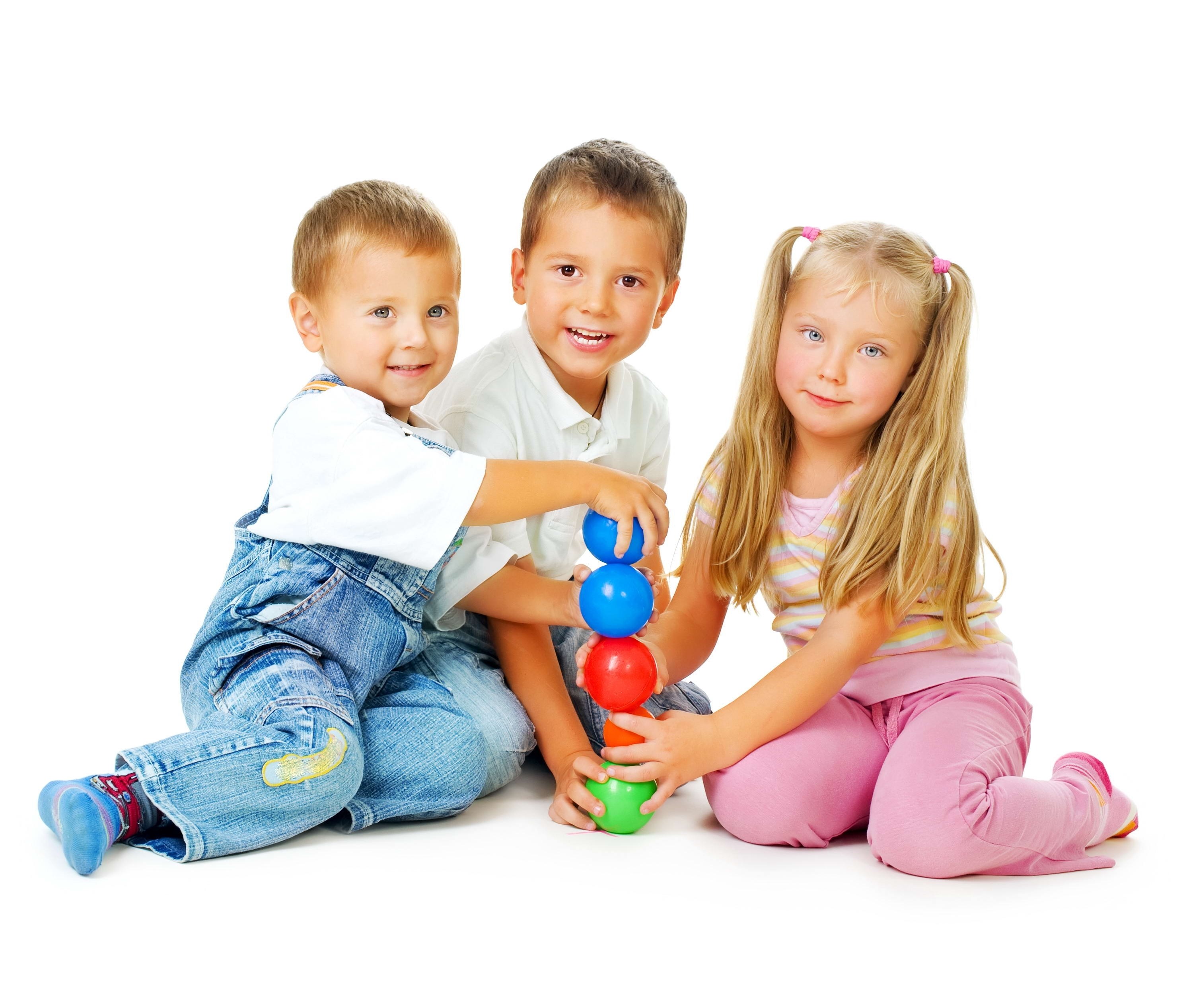 children playing with colorful balls