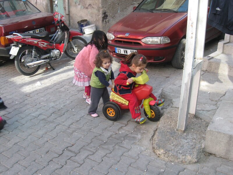 Children playing with toy car