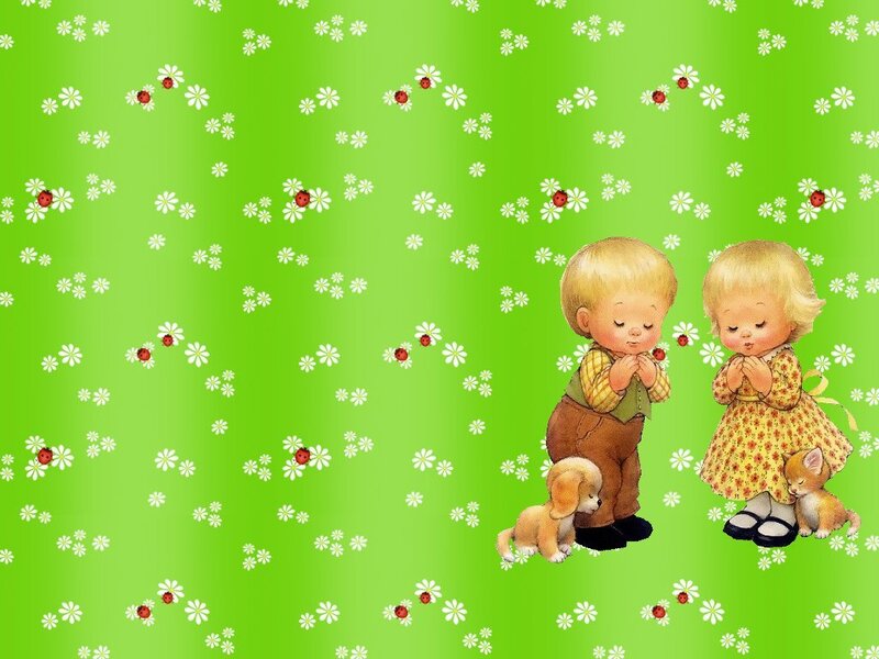 children praying in a garden