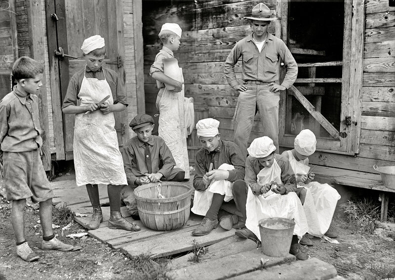 Children preparing food with soldier