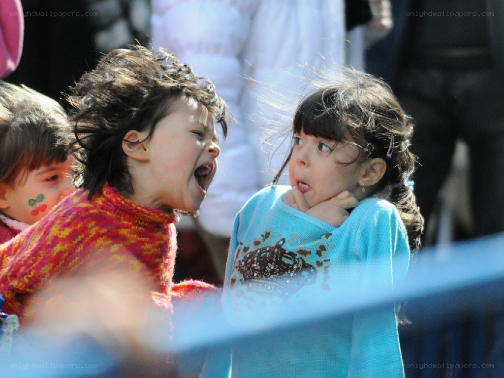 Children reacting to wind