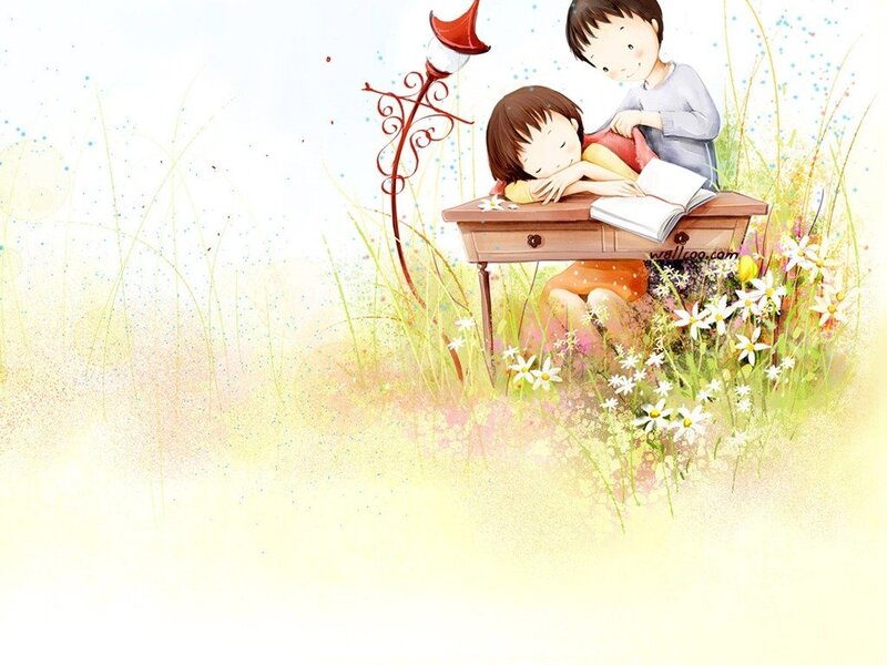 Children reading in a field