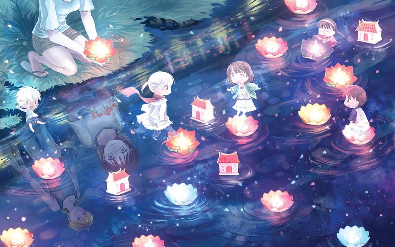 Children releasing lanterns on water