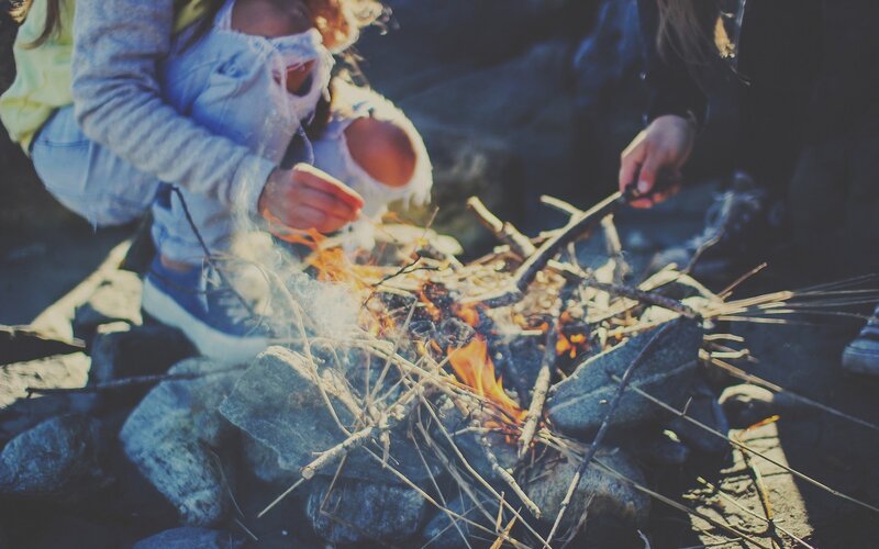 Children roasting marshmallows