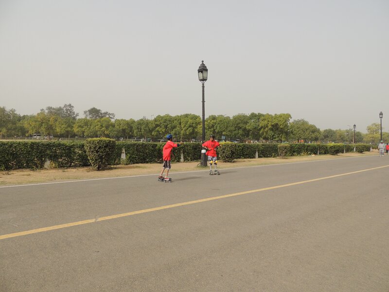 Children roller skating on a path