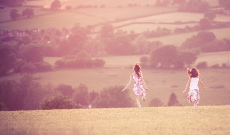 children running in a field