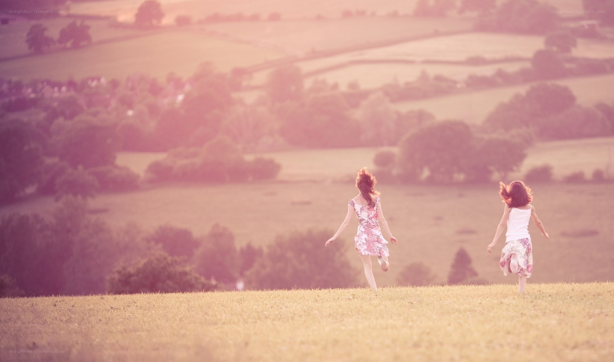 children running in a field