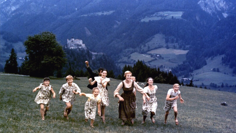 Children Running on a Hill