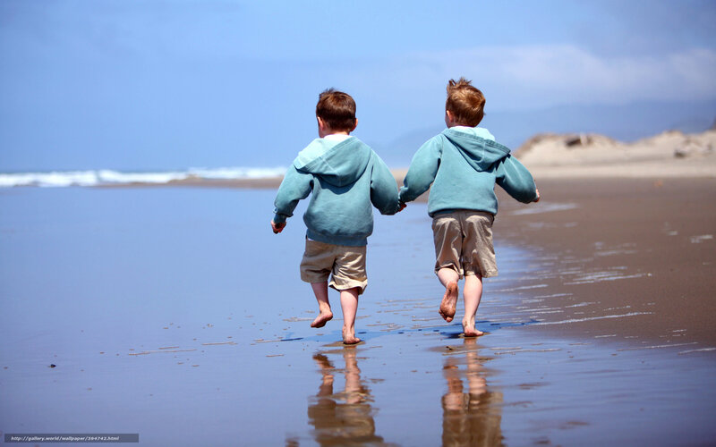 children running on beach