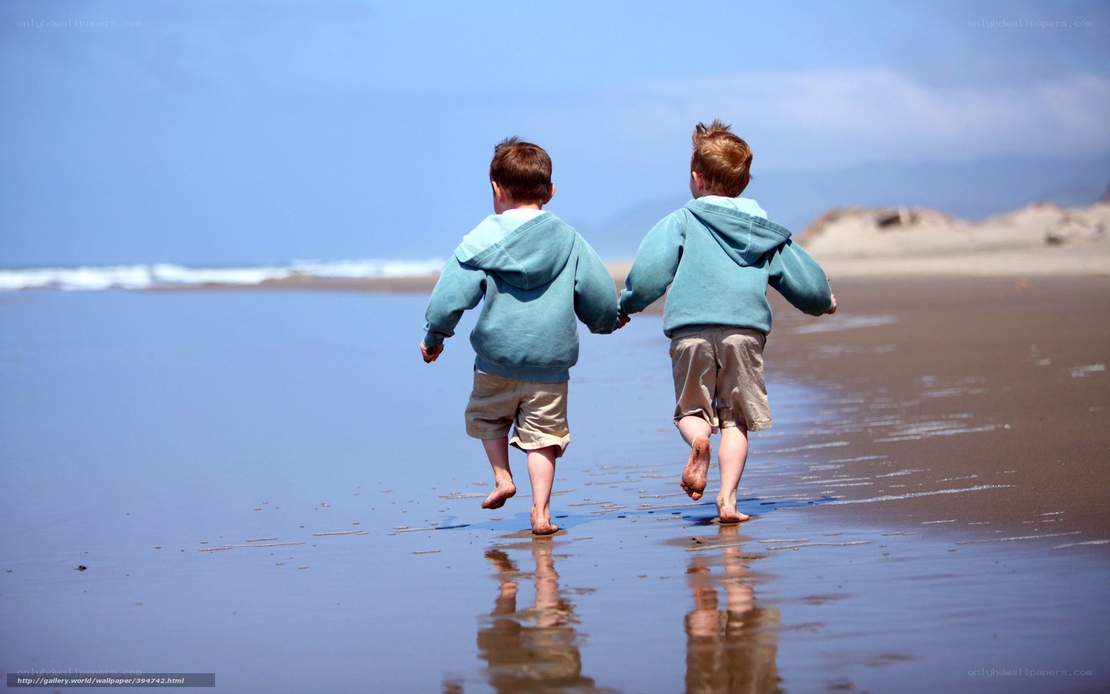 children running on beach