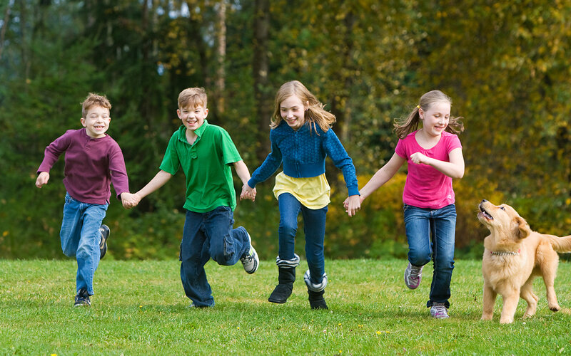 Children Running with Dog