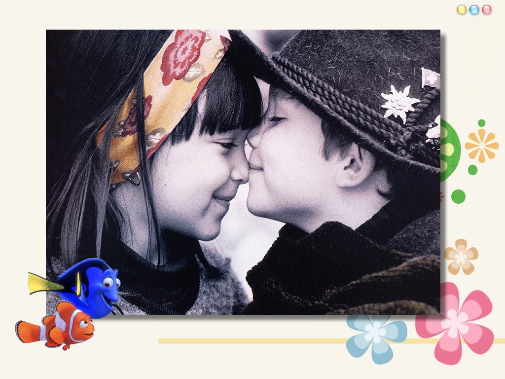 children sharing a kiss