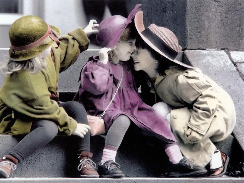 Children sharing a moment on steps