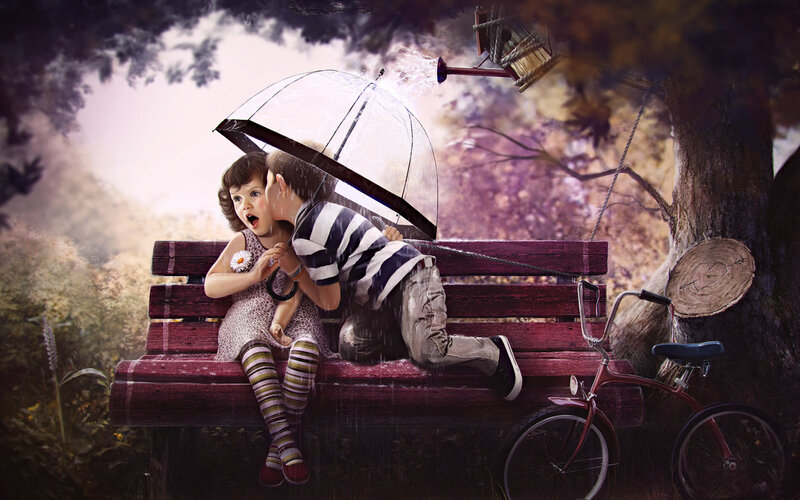 Children sharing a secret under an umbrella