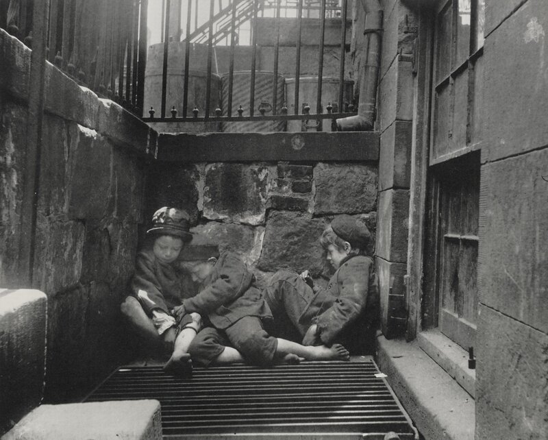 Children sleeping in alleyway
