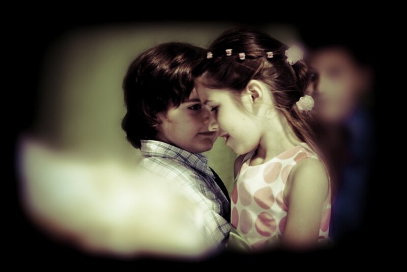 children touching foreheads