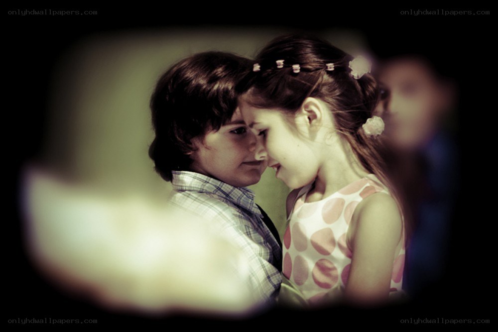 children touching foreheads