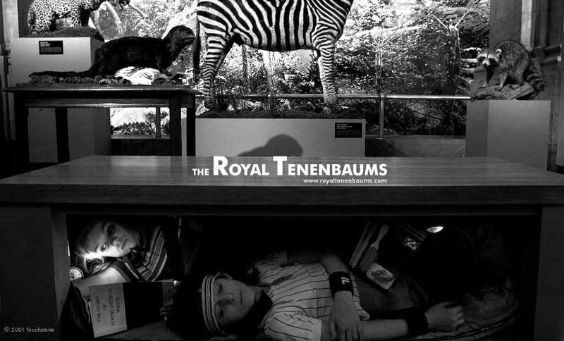 Children under a museum table