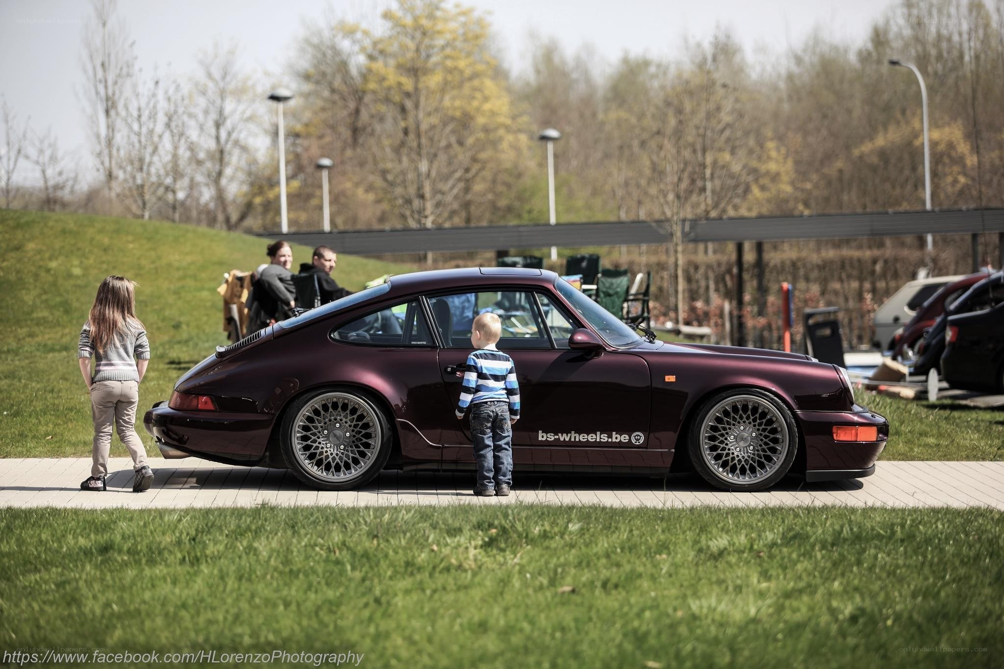 Children viewing a classic car