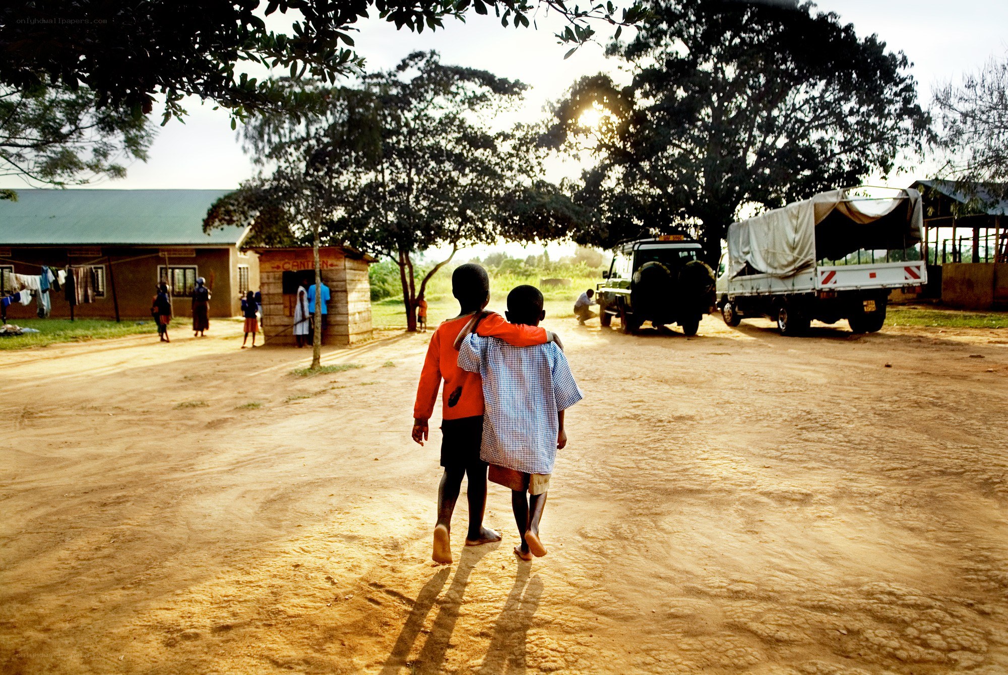 Children walking in a village