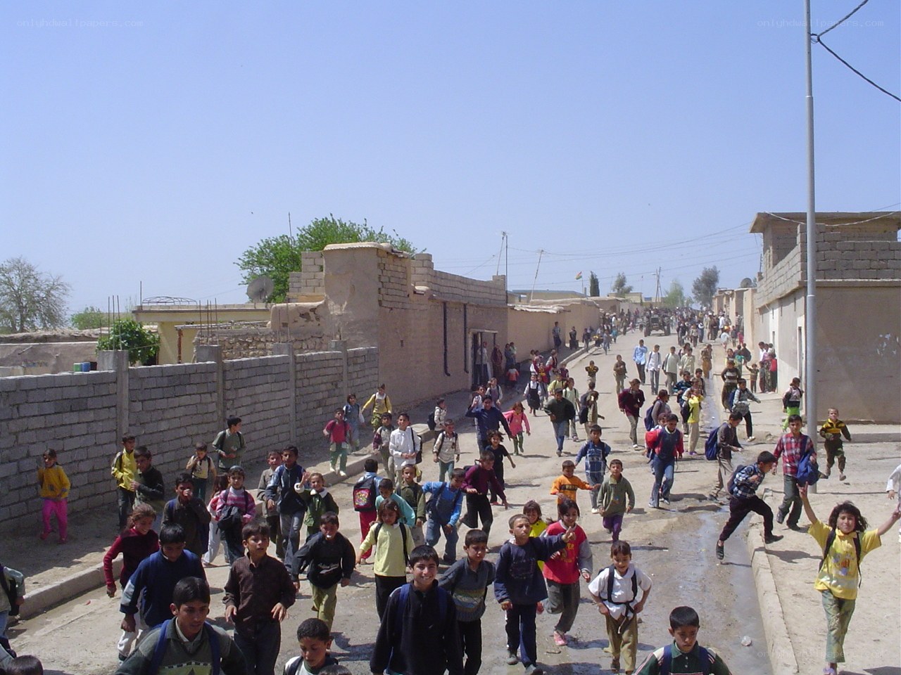 Children walking on a street