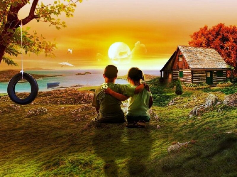 Children watching sunset by the sea