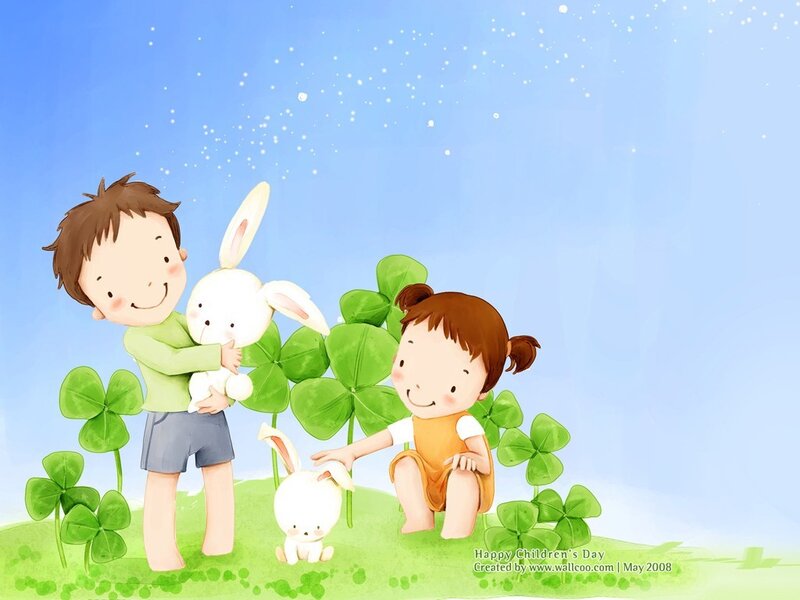 Children with bunnies in clover field