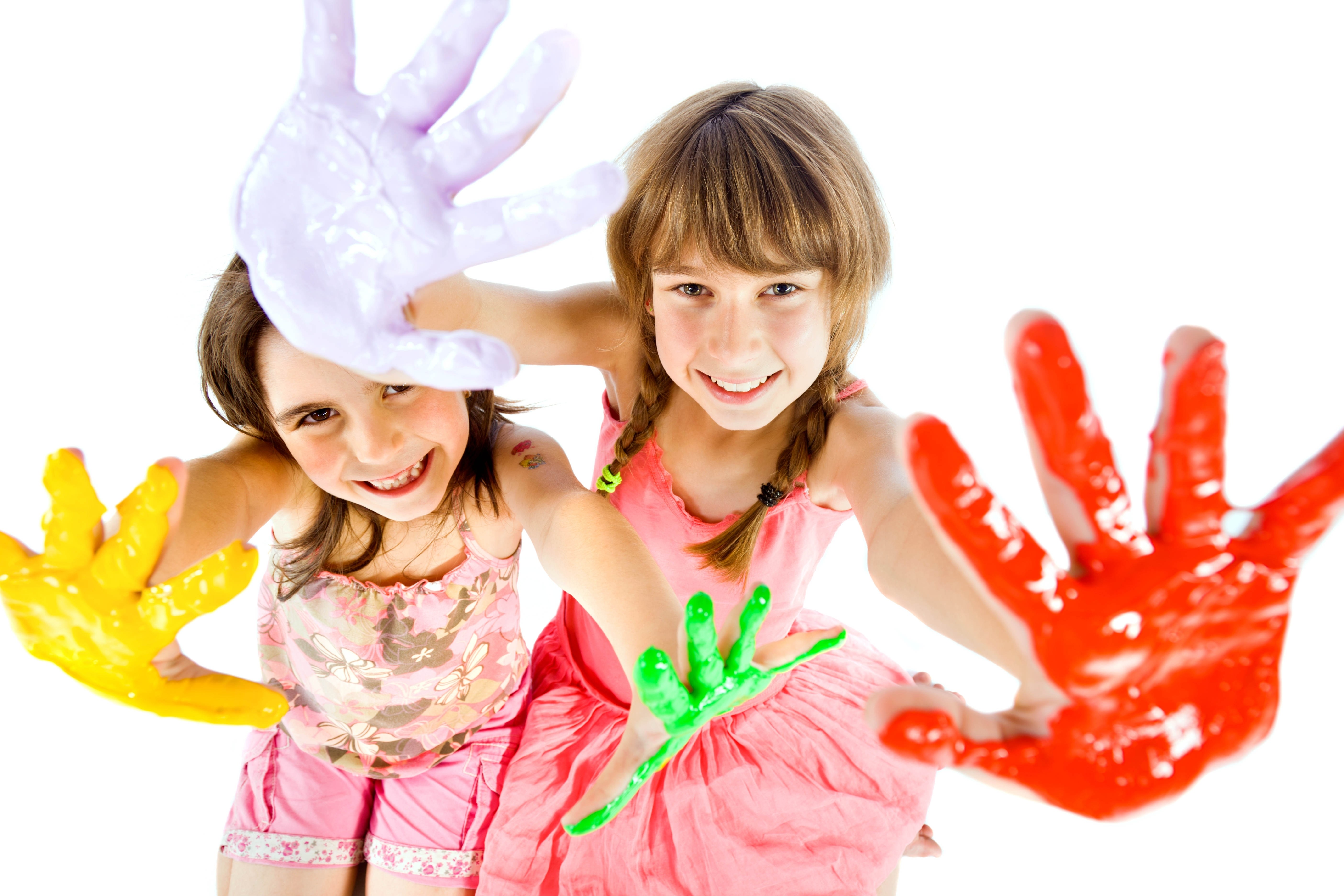 children with colorful handprints
