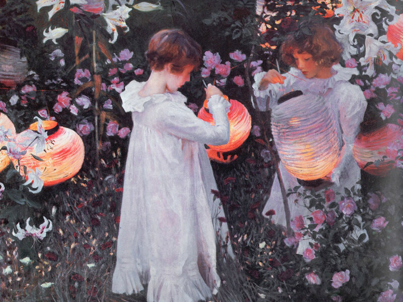 Children with lanterns in garden