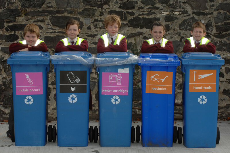 Children with recycling bins