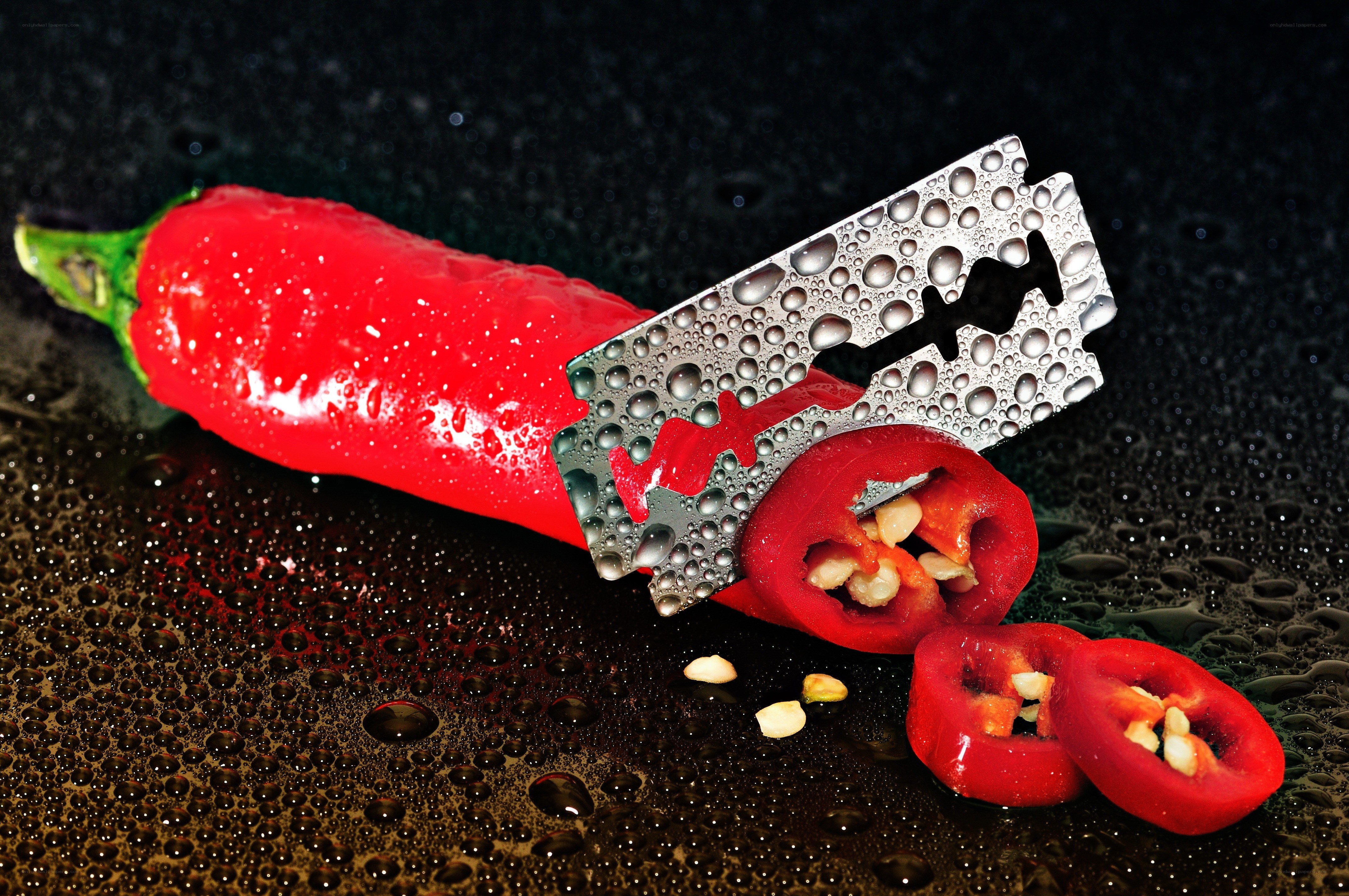 Chili pepper with razor blade