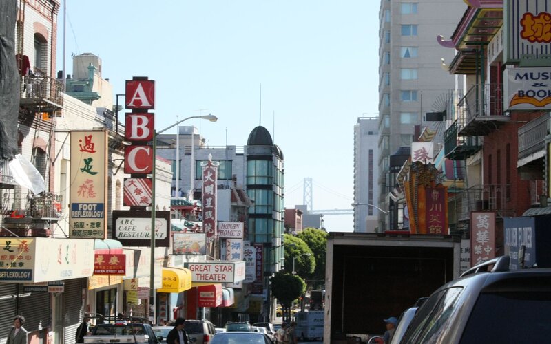 Chinatown street scene with Golden Gate Bridge