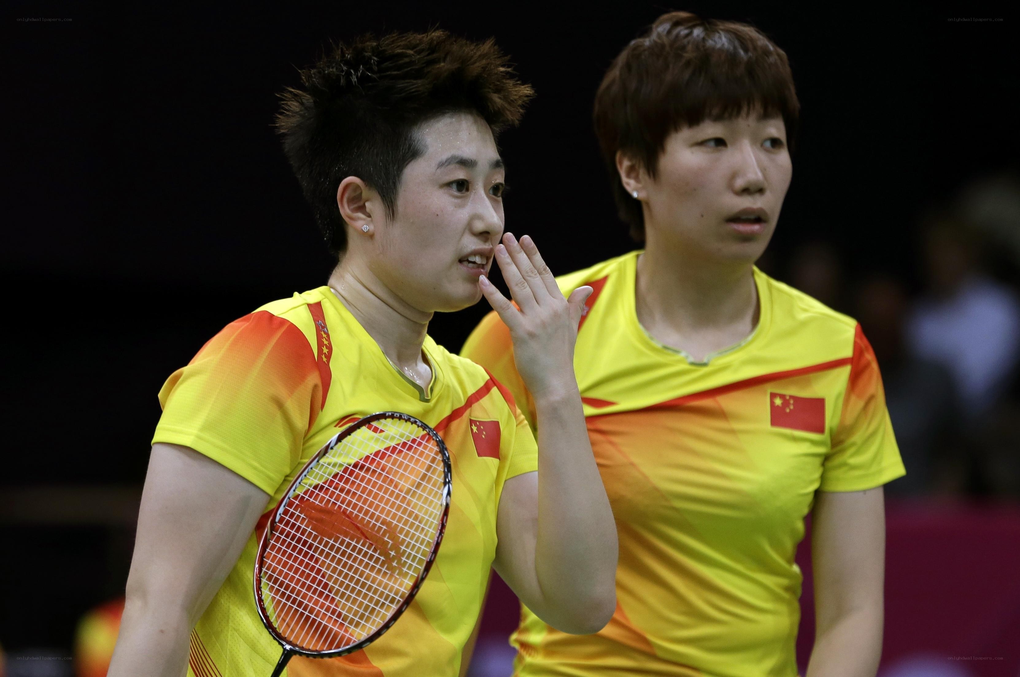 Chinese badminton players in action