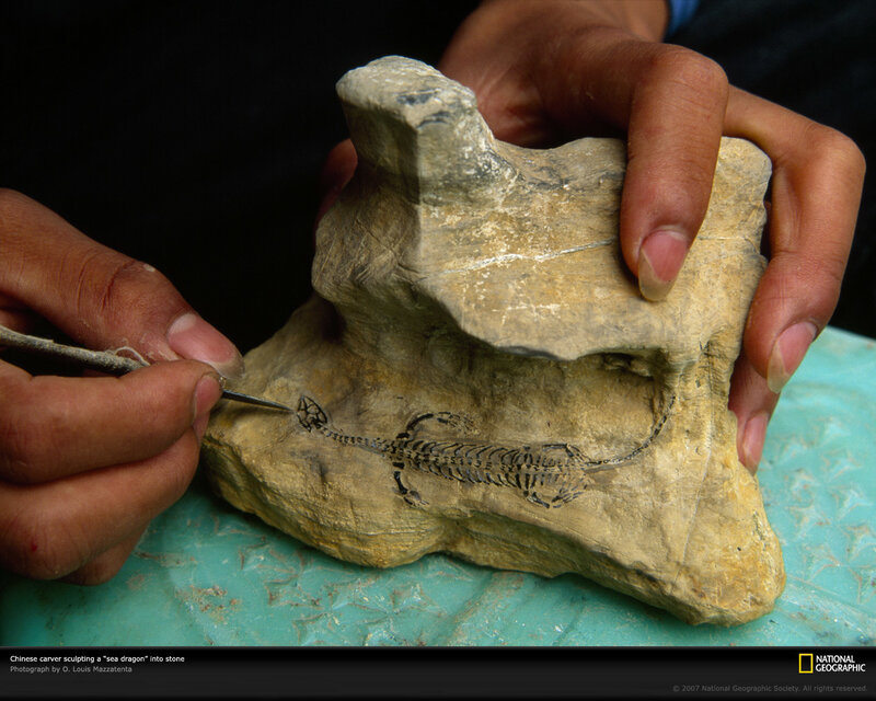 Chinese carver sculpting sea dragon