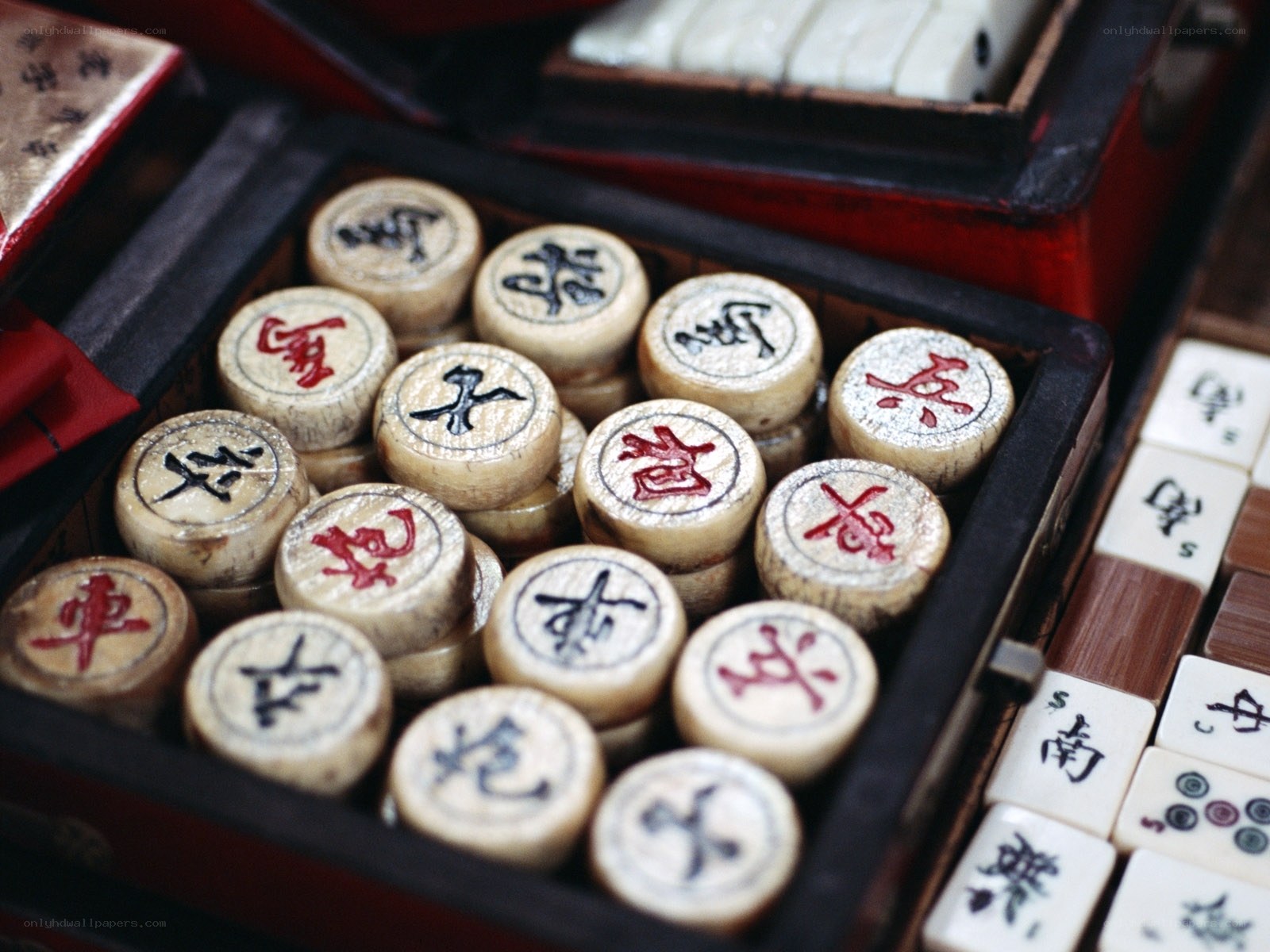 Chinese chess pieces in a box