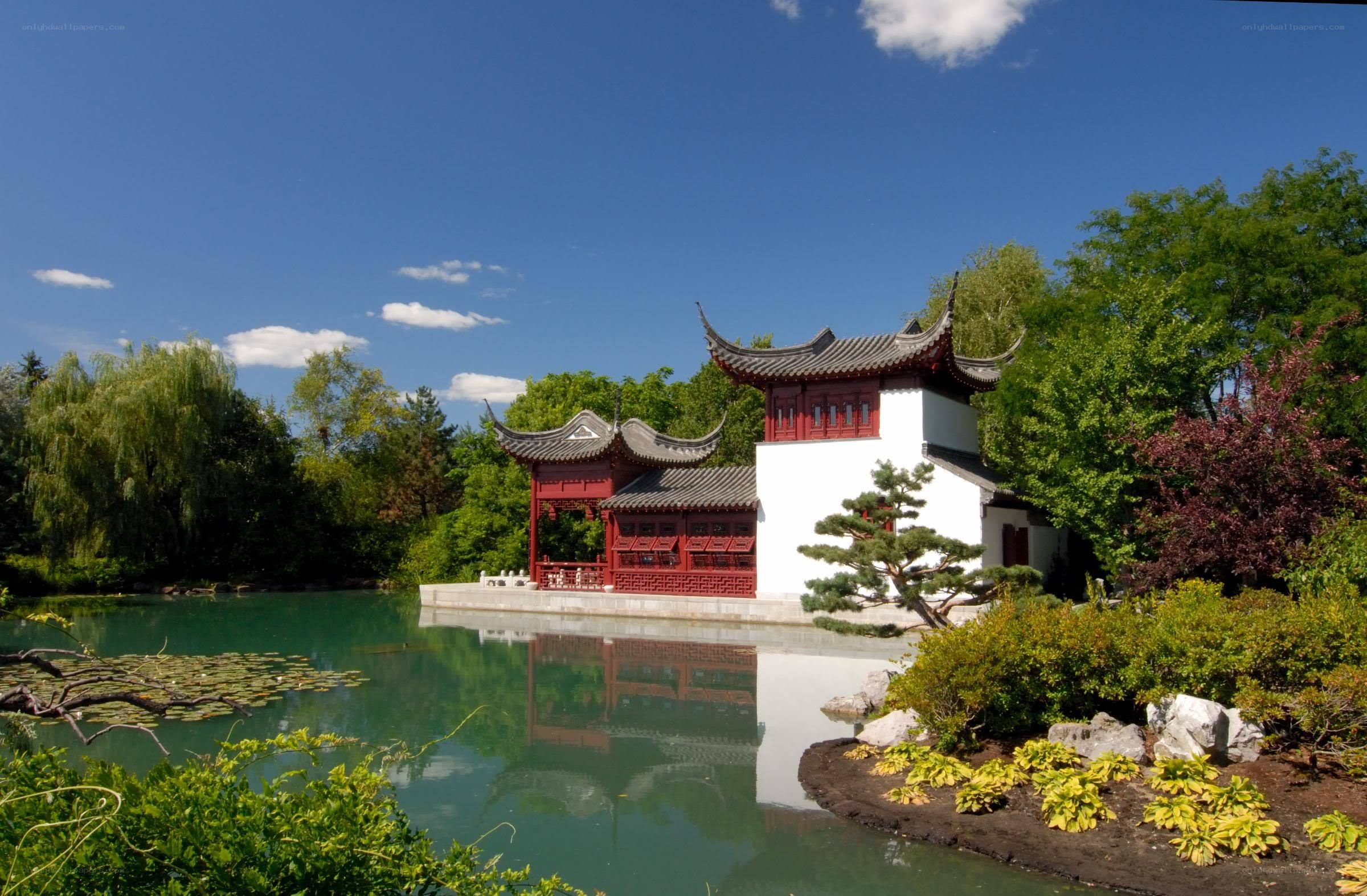 Chinese garden pavilion by a pond