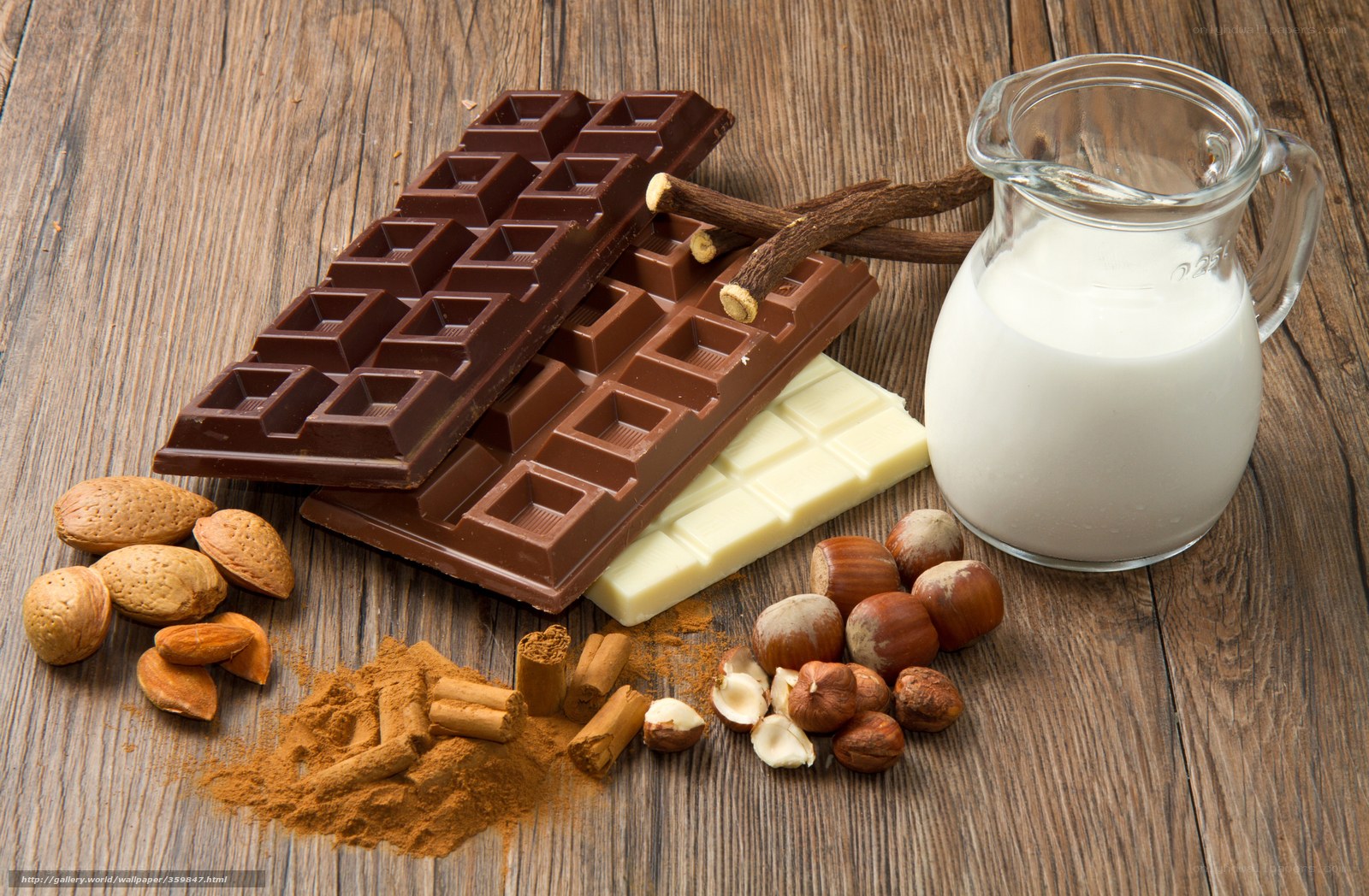 chocolate and nuts on wood