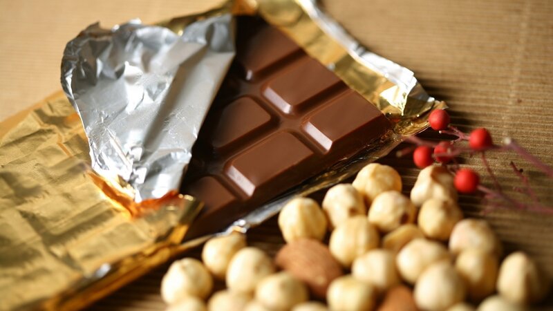 Chocolate Bar with Hazelnuts — Brown, Calm, Photograph, Berries, Foil Wrapper